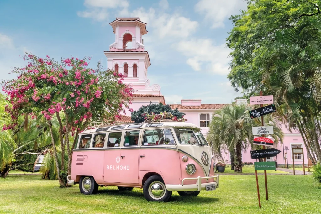 Pink vintage Volkswagen van outside Hotel das Cataratas during the festive season in Foz do Iguaçu, Brazil