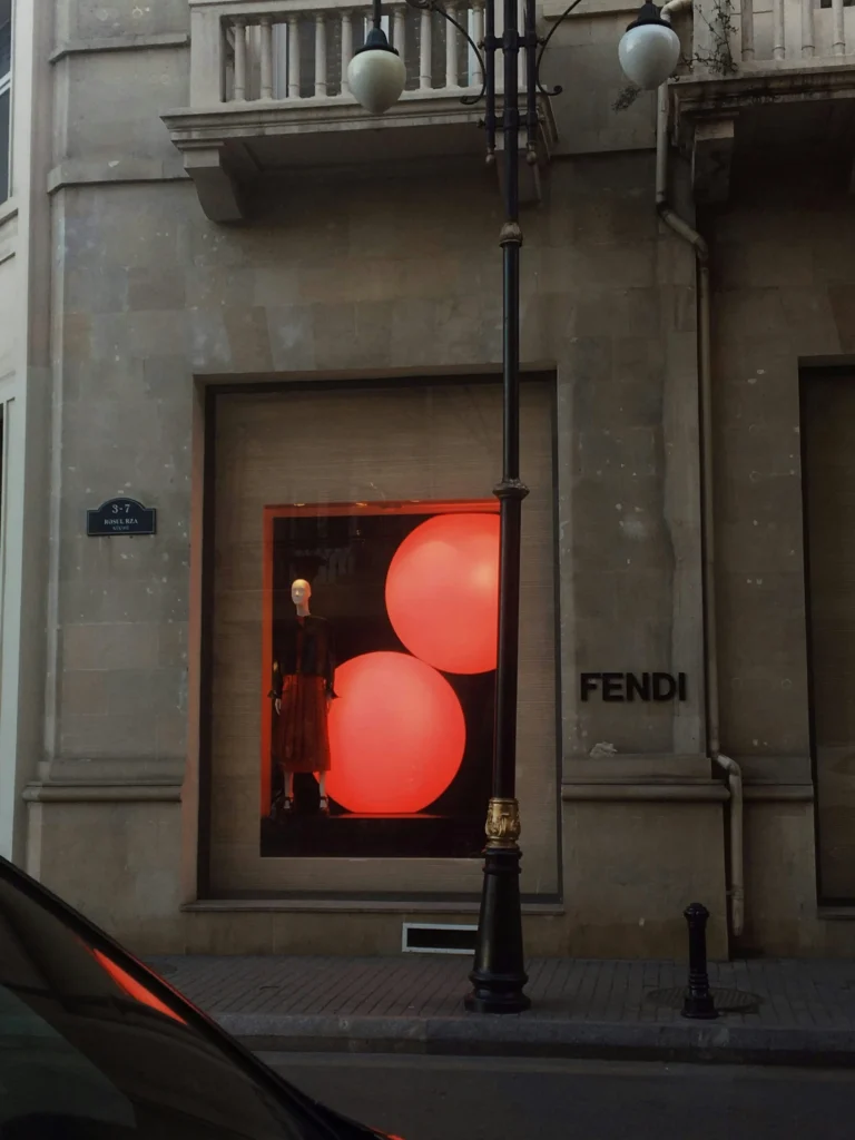 Fendi storefront window with red lantern-like lights